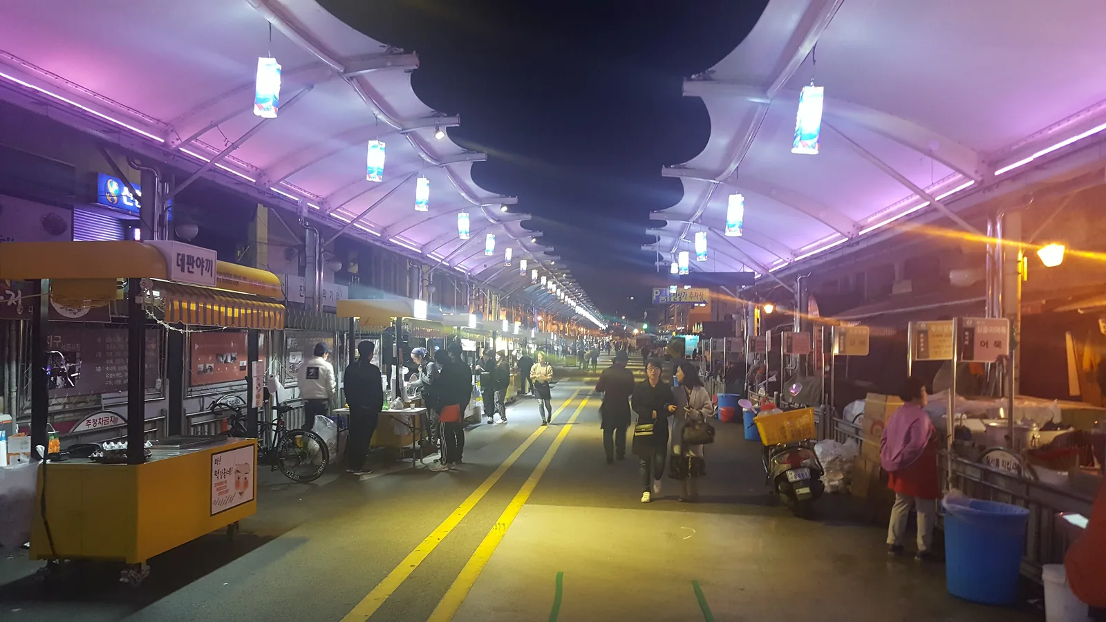 Food stalls lit up along Seomun Night Market, Daegu