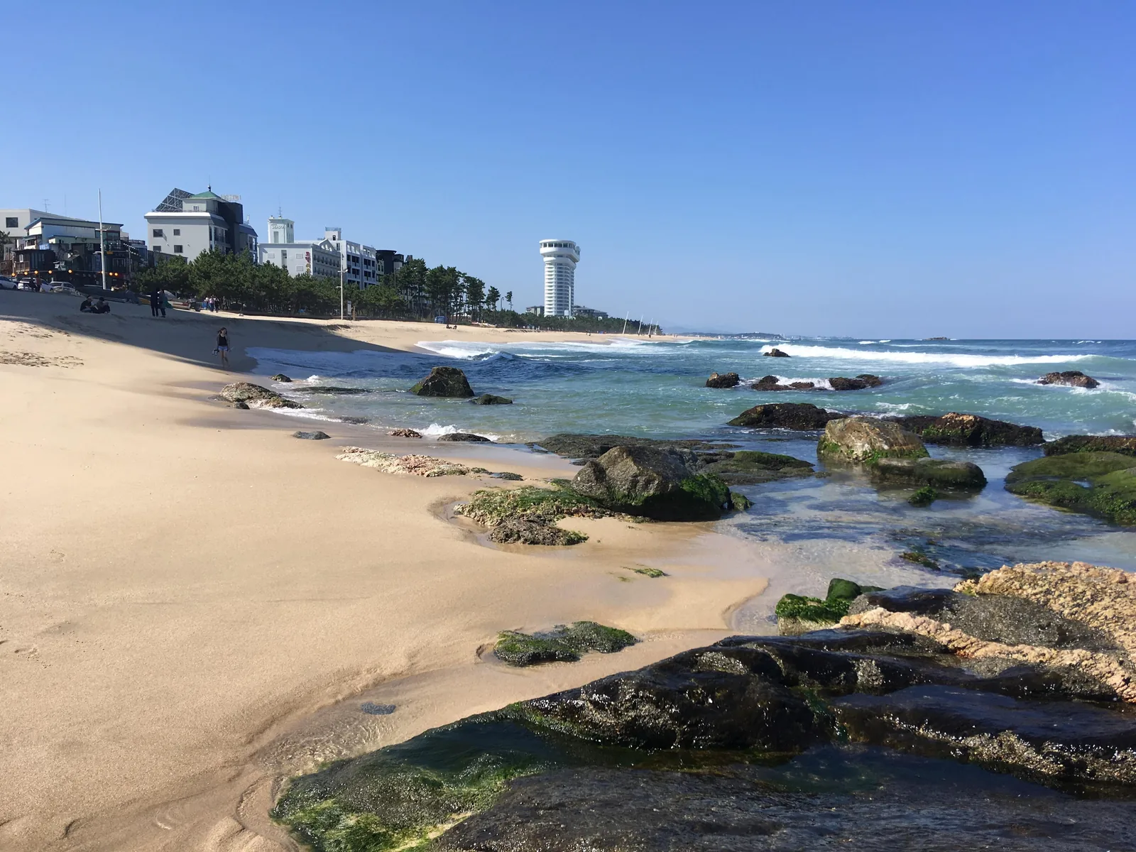 Sand, rocks and surf at Gyeongpo Beach, Gangneung