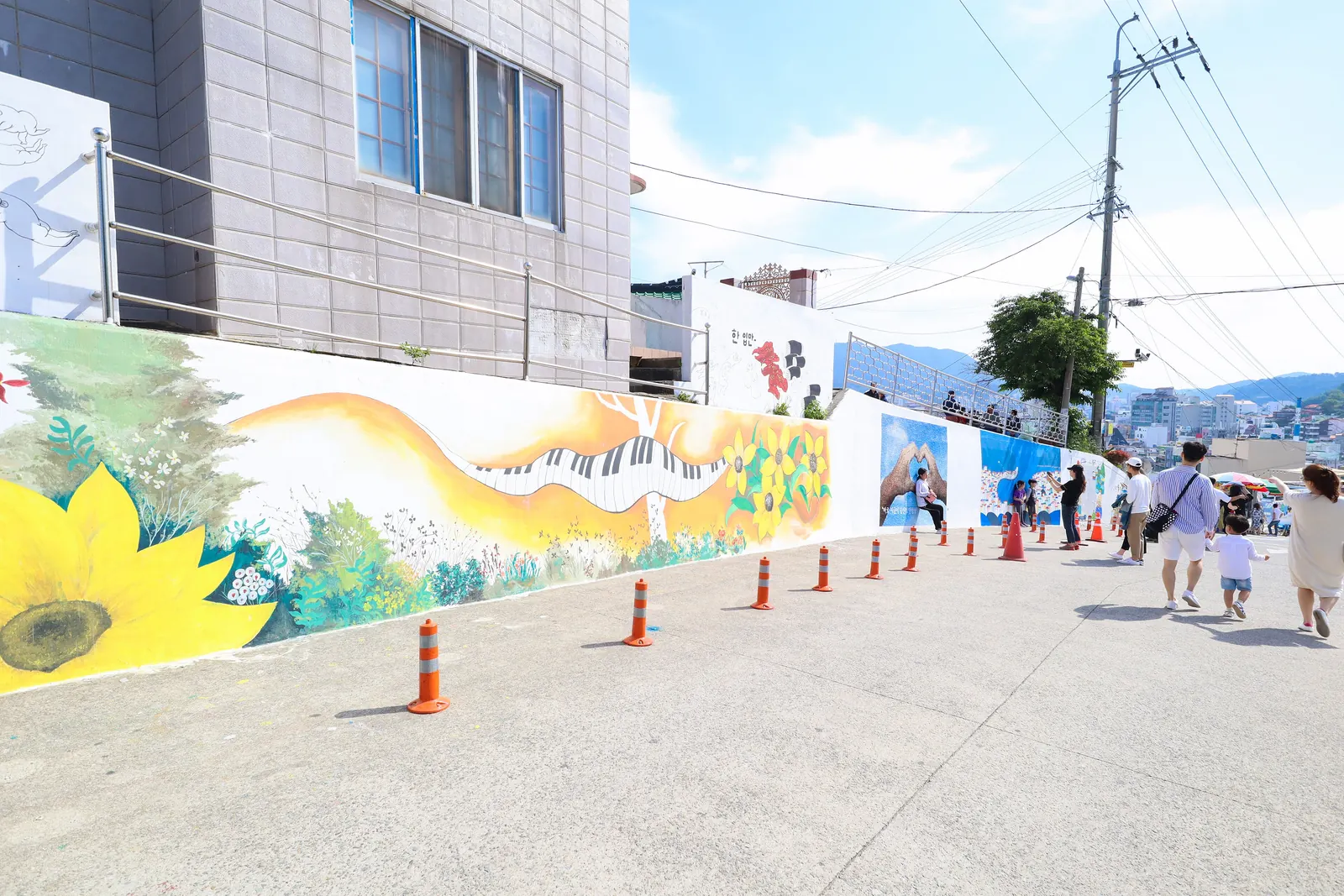 Painted walls along a lane in Dongpirang Village above Gangguan, Tongyeong